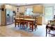 Bright, spacious kitchen with a dining table and stainless steel appliances at 3032 Mckinney Rd, Shelby, NC 28152