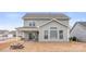 Back exterior view featuring a patio, a fire pit, and gray siding at 3041 Winged Teal Ct, Belmont, NC 28012