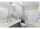 Bathroom with a single sink vanity and a shower-tub combo at 3041 Winged Teal Ct, Belmont, NC 28012