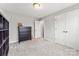 Cozy bedroom with a dresser, closet, and neutral color scheme at 3041 Winged Teal Ct, Belmont, NC 28012
