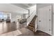 Spacious living room featuring an open concept view to the dining room and beautiful hardwood floors at 3041 Winged Teal Ct, Belmont, NC 28012