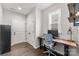 Bright office space with wood desk, natural light from window, and modern fixtures at 3041 Winged Teal Ct, Belmont, NC 28012
