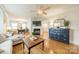 Inviting living room featuring hardwood floors, a fireplace, and stylish decor at 3510 Conway Ave, Charlotte, NC 28209