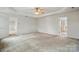 Spacious main bedroom features a tray ceiling and an ensuite bathroom at 3619 Grove Creek Pond Sw Dr, Concord, NC 28027