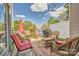 Outdoor patio with lake views, seating, grill, and rug for relaxing and enjoying the picturesque scenery at 4011 Fenworth Ct, Fort Mill, SC 29715