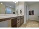 Bathroom featuring a vanity with ample counter space, lots of lighting, and warm tile flooring at 4011 Fenworth Ct, Fort Mill, SC 29715
