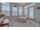Cozy sunroom with lots of natural light, a comfortable chaise lounge, and access to the outdoor space at 4011 Fenworth Ct, Fort Mill, SC 29715
