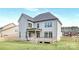 A well maintained backyard with a porch offers a great entertainment space at 4036 Meadowview Hills Dr # 7, Charlotte, NC 28269