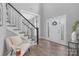 Welcoming foyer with staircase and plenty of natural light at 4036 Meadowview Hills Dr # 7, Charlotte, NC 28269