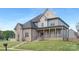 Beautiful two-story home featuring a classic design and inviting entrance at 4036 Meadowview Hills Dr # 7, Charlotte, NC 28269