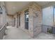 Close-up of the front porch, highlighting the brickwork and covered entryway at 4036 Meadowview Hills Dr # 7, Charlotte, NC 28269