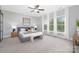 Spacious main bedroom with large windows and ample natural light at 4036 Meadowview Hills Dr # 7, Charlotte, NC 28269