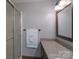 Bathroom with a frosted glass enclosed shower and granite topped vanity at 4256 Wood Forest Dr, Rock Hill, SC 29732