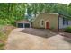 View of the home's exterior, featuring a two-car garage and a concrete driveway leading to the house at 4256 Wood Forest Dr, Rock Hill, SC 29732
