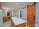 Spacious kitchen with island and wood cabinets, conveniently located near the breakfast nook and doorway at 4256 Wood Forest Dr, Rock Hill, SC 29732