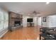 Cozy living room with refinished floors and a corner fireplace at 4256 Wood Forest Dr, Rock Hill, SC 29732