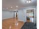 Bright living room featuring hardwood floors and open entryway to dining and living areas at 4256 Wood Forest Dr, Rock Hill, SC 29732