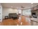 Comfortable living room featuring fireplace, hardwood floors, and plenty of natural light at 4256 Wood Forest Dr, Rock Hill, SC 29732