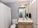 Neutral bathroom featuring a single vanity and tub/shower at 4743 Morning Dew Ct # 4743, Charlotte, NC 28269
