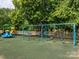 Fun playground featuring swings, slides, and play structures for children to enjoy in a safe and inviting environment at 4743 Morning Dew Ct # 4743, Charlotte, NC 28269