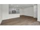 Spacious living room with hardwood floors and ample natural light, perfect for entertaining at 5104 Shasta St # 5104, Gastonia, NC 28052