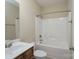 Bright bathroom with vanity, tiled floor, combination tub and shower, and chrome fixtures at 5135 Norway Ln, Rock Hill, SC 29732