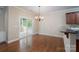 Bright dining area with hardwood floors and sliding glass doors to the outside at 5135 Norway Ln, Rock Hill, SC 29732