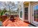 Inviting back deck with an outdoor dining set, perfect for enjoying the serene backyard views at 609 Tysons Forest Dr, Rock Hill, SC 29732