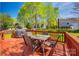 Inviting back deck with an outdoor dining set, perfect for enjoying the serene backyard views at 609 Tysons Forest Dr, Rock Hill, SC 29732