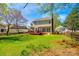 The property showcases a sprawling backyard with a deck and mature trees, providing a private retreat at 609 Tysons Forest Dr, Rock Hill, SC 29732