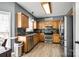 Cozy kitchen with oak cabinets, granite countertops, stainless steel appliances, and tile backsplash at 609 Tysons Forest Dr, Rock Hill, SC 29732