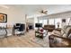 The living room features a brick fireplace, wood floors, and plenty of natural light, perfect for gatherings at 609 Tysons Forest Dr, Rock Hill, SC 29732