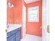 Bathroom featuring a vanity with a sink and a window for natural light at 6123 Glen Manor Dr, Charlotte, NC 28269