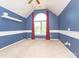 Bright bedroom featuring a large arched window, and a vaulted ceiling with ceiling fan at 6123 Glen Manor Dr, Charlotte, NC 28269