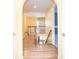 View of the upstairs hallway with wood floors and wood banister at 6123 Glen Manor Dr, Charlotte, NC 28269