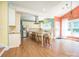 Open gourmet kitchen boasts a center island, stainless appliances, lots of cabinets, and a decorative chandelier at 6123 Glen Manor Dr, Charlotte, NC 28269