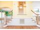 View of the staircase that features hardwood stairs, white banisters, and decorative trim, and molding on the walls at 6123 Glen Manor Dr, Charlotte, NC 28269