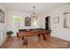 Spacious game room featuring a billiard table, elegant lighting, and neutral wall colors at 620 Baneberry Bluff Ct, Rock Hill, SC 29732