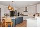 Bright kitchen featuring a large island, white countertops, and stainless steel appliances at 620 Baneberry Bluff Ct, Rock Hill, SC 29732