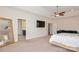 Large primary bedroom with carpet, sitting area, and ensuite bathroom at 620 Baneberry Bluff Ct, Rock Hill, SC 29732