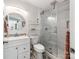 Modern bathroom with stylish vanity, decorative floors, and a sleek glass shower at 6310 Welford Rd, Charlotte, NC 28211