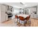 Modern kitchen featuring stainless steel appliances and a large center island at 6310 Welford Rd, Charlotte, NC 28211