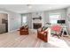 Inviting living room features a fireplace, a desk, and comfortable seating at 6310 Welford Rd, Charlotte, NC 28211