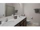Bathroom featuring a double sink vanity with modern faucets and fixtures at 637 Amber Meadows Way, Fort Mill, SC 29708