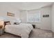 Bright, cozy bedroom featuring natural light and a comfortable queen bed at 637 Amber Meadows Way, Fort Mill, SC 29708