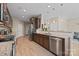 Modern kitchen with stainless steel appliances, granite countertops, and an open layout at 637 Amber Meadows Way, Fort Mill, SC 29708