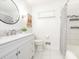 Bright bathroom with updated fixtures, stylish vanity, tiled floors, and shower at 7024 Rockledge Dr, Charlotte, NC 28210