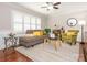 Comfortable living room with stylish furniture and a ceiling fan at 7024 Rockledge Dr, Charlotte, NC 28210