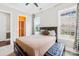 Cozy bedroom with plush bed, natural light, and a walk-in closet for optimal organization at 705 Brown Creek Dr, Matthews, NC 28104