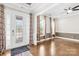 Inviting foyer featuring hardwood floors and stylish curtains at 705 Brown Creek Dr, Matthews, NC 28104